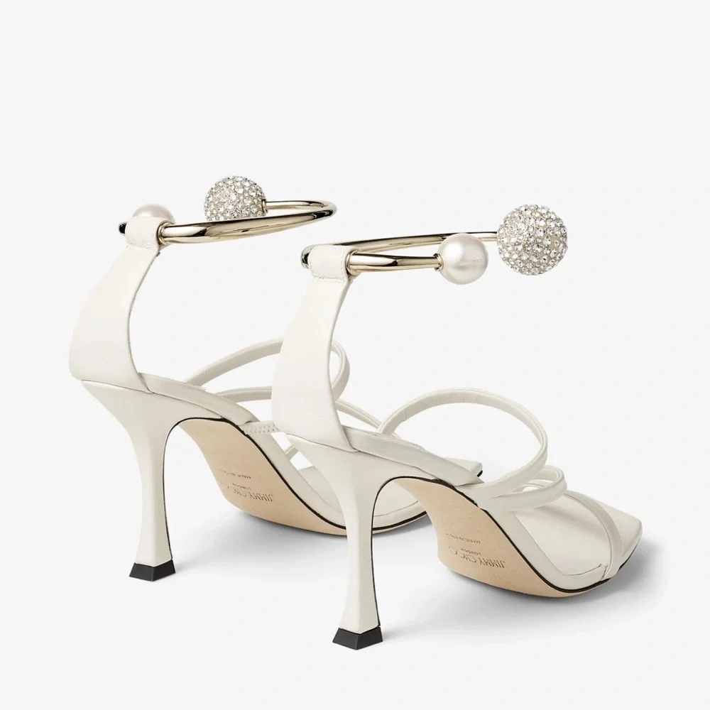 Jimmy Choo excellent minor